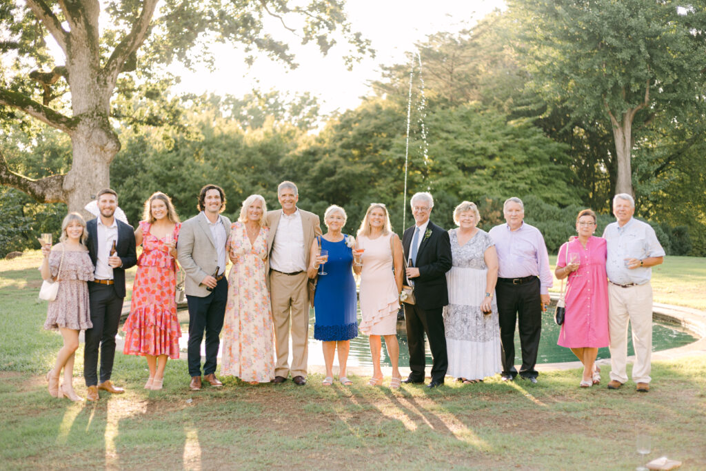 Family photos at Cheekwood Wedding in Nashville, TN - guests demonstrating good guest etiquette on the wedding day. 