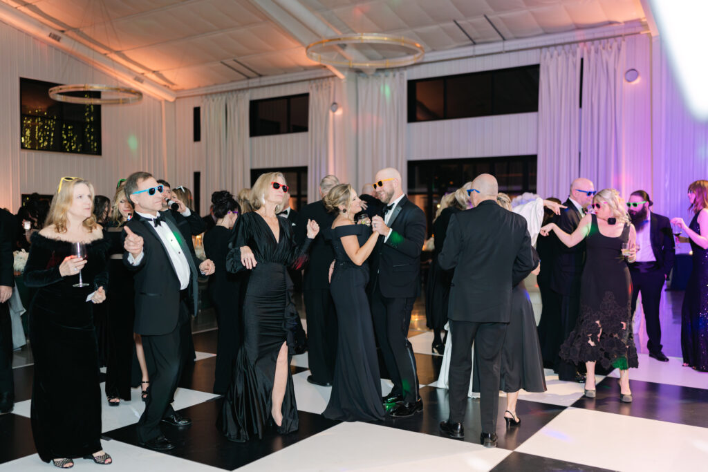 A curated wedding guest list can have your reception photos looking like this. 