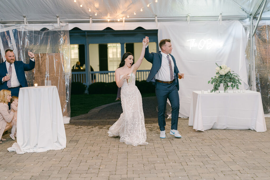 Ravenswood Mansion wedding - Couple entering reception