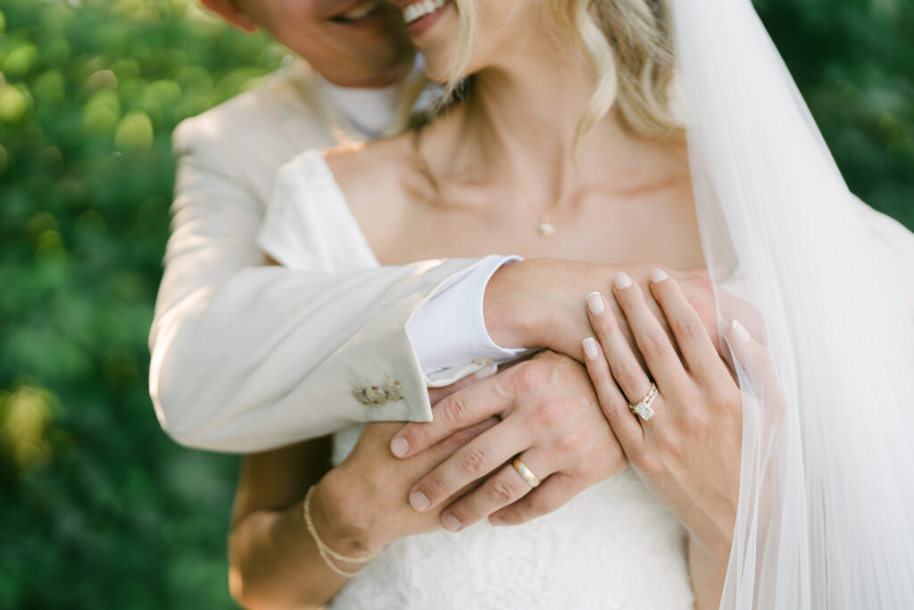Newly married couple taking time for portraits at Southall Meadows. 